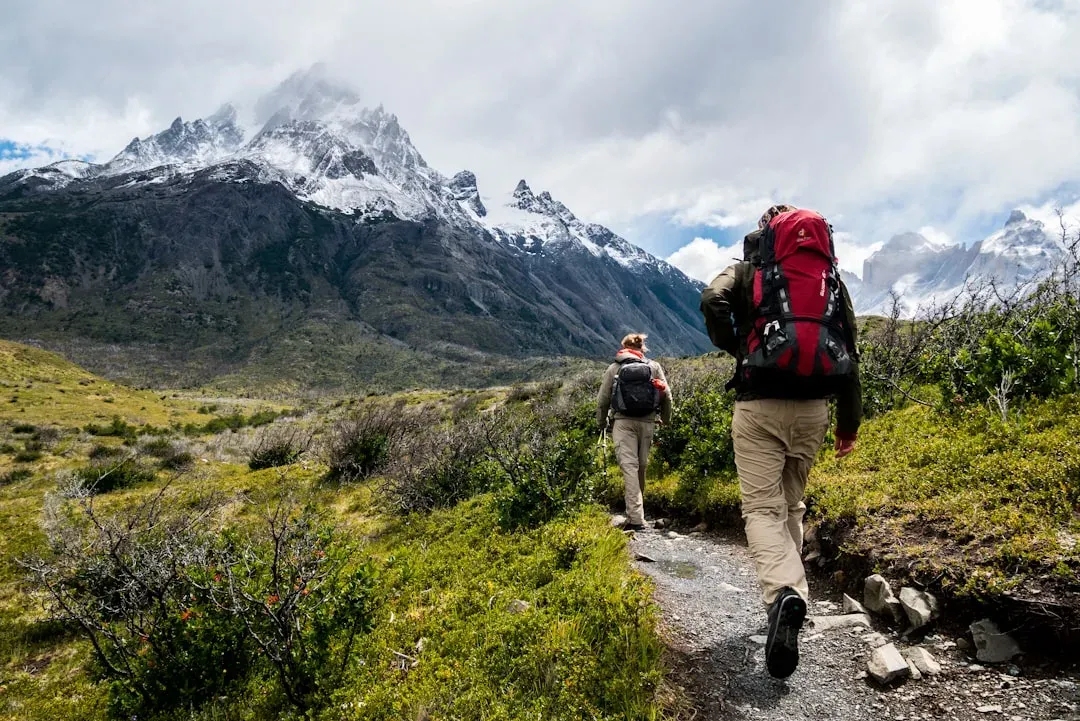officials issuing trekking permits in a mountain village
